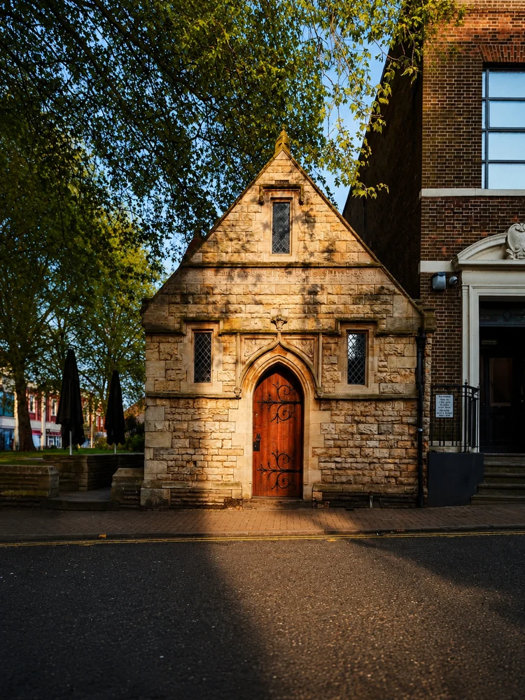 The stone exterior of Vestry Hall Coffee on Free School Lane